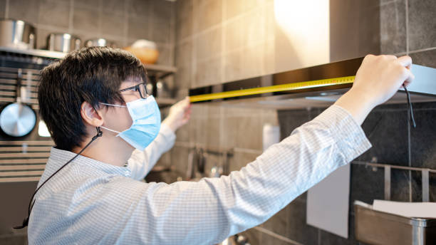 Comment installer une hotte aspirante de 90 cm